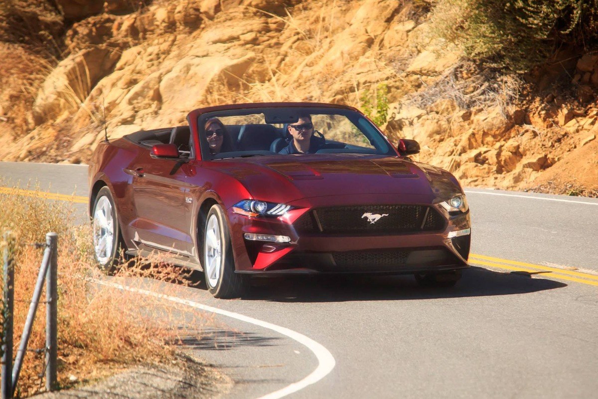 2020 Burgundy /Black Ford Mustang GT Convertible (1FATP8FF9L5) with an 5.0L V8 DOHC 32V engine, Automatic transmission, located at 3160 South Valley View Blvd, Las Vegas, NV, 89146, (888) 750-6845, 36.132458, -115.190247 - In some ways, the 2020 Ford Mustang is just as you'd expect it to be. It has rear-wheel drive, an available 5.0-liter V8 under the hood, and all sorts of factory options to make it faster, louder, and more distinctive. What you might not expect about the Mustang is the way Ford has committed to the- Photo#3