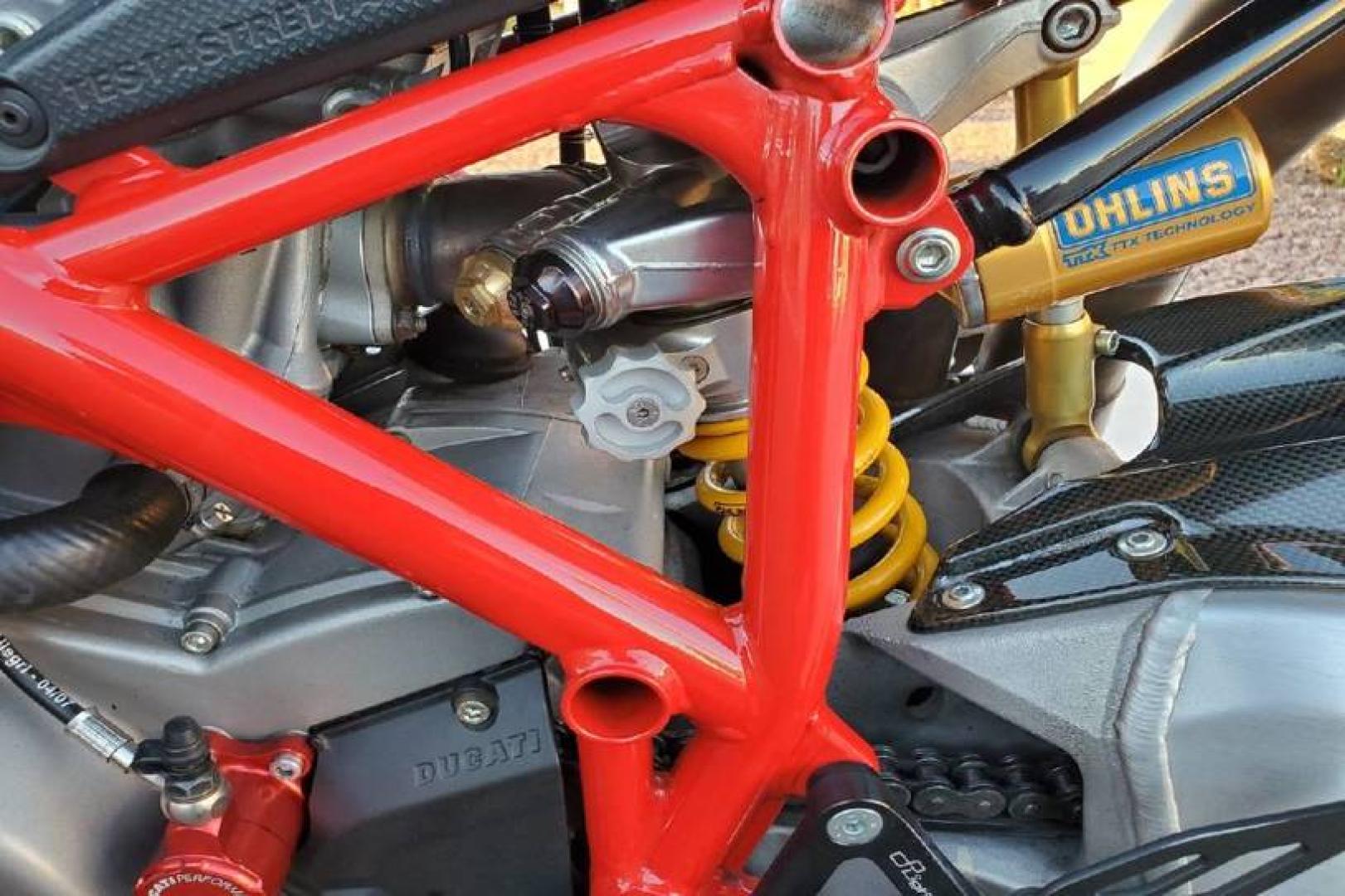 2008 Ducati 1099 S S (ZDM1XBEW18B) with an 1,098 cc L twin engine, Six-Speed Dry Clutch transmission, located at 3160 South Valley View Blvd, Las Vegas, NV, 89146, (888) 750-6845, 36.132458, -115.190247 - The Ducati 1098S boasts some gorgeous bodywork and slick design cues, but its real masterpiece lies beneath those pretty plastic panels. Underneath is a tubular steel trellis frame optimized for stiffness, and an L-twin engine produces 160 horsepower and 90.4 lb-ft of torque, routing exhaust fumes t - Photo#9